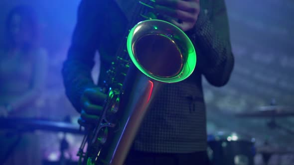 Man Playing Saxophone During Concert. Close Up