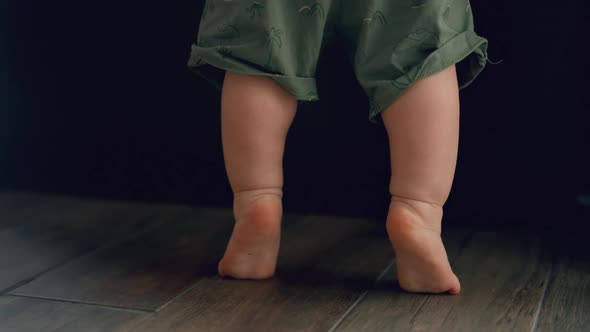 Little Feet Walking on Floor Closeup