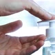 Male Hands Push the Dispenser and Squeeze Out Liquid Soap - VideoHive Item for Sale