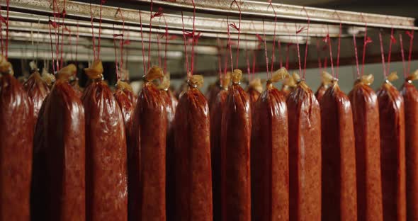 Suspended Sausage Sticks Are Smoked In The Oven
