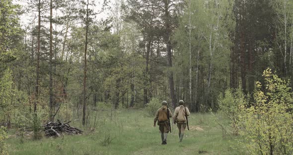 Russian Soviet Infantry Red Army Soldiers Of World War II Marching Walking Along Forest Road In