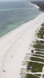 Vertical Video Boats in the Ocean Near the Coast of Zanzibar Tanzania