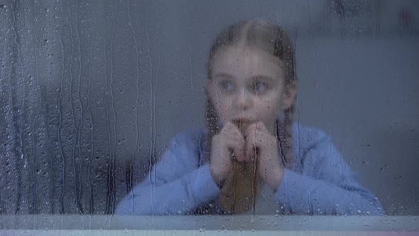 Hungry Orphan Child Eating Piece of Bread, Social Insecurity, Children Rights