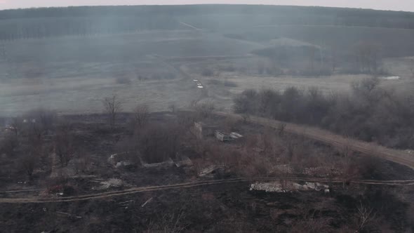 Ecological Problems. Videography of a Village with a Burning Field, Smoke Spreads Across the Field