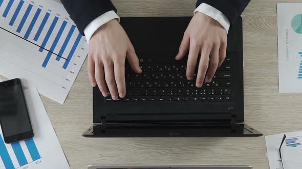 Hands of Managers Typing on Laptop at Workplace, Cooperation and Teamwork