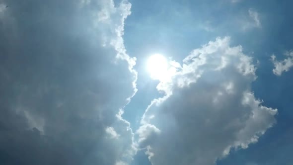 Timelapse Footage of Clear Blue Sky with White Clouds and Sunlight