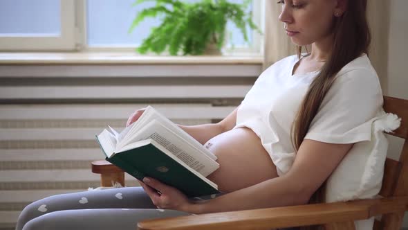 Home Mother Pregnant Woman Sit in Armchair and Read Book and Relax Spbd