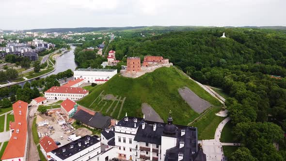 Gediminas Castle and Three crosses hill in distance, aerial view