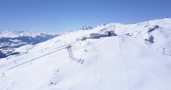 Snow Covered Mountains on Sunny Winter Day with Clear Sky