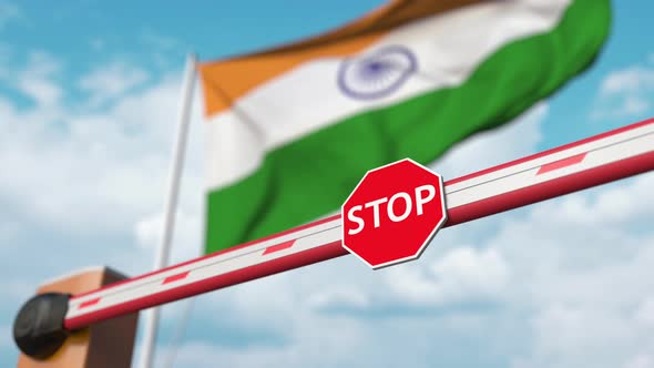 Barrier Gate Opens Near Flag of India alt