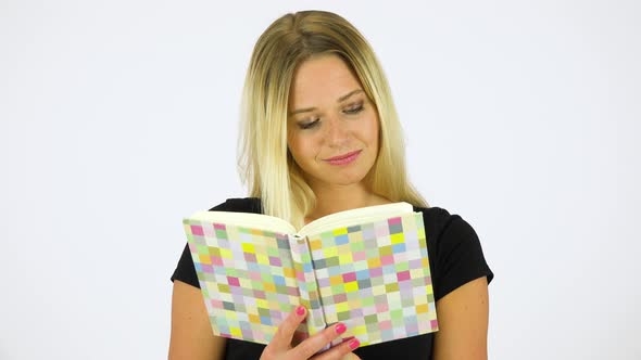 A Young Beautiful Woman Reads a Book - White Screen Studio
