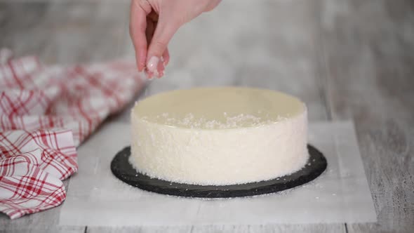 White Mousse Cake Sprinkled with Coconut Flakes Decorated Coconut Closeup