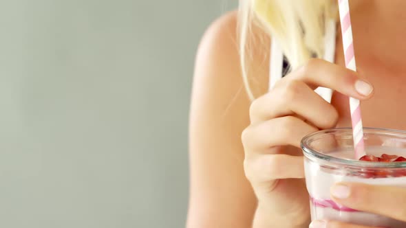 Woman drinking smoothie