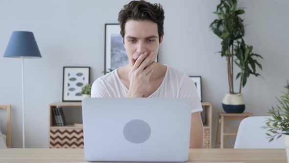 Shocked, Stunned Man Working on Laptop