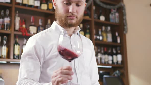 Sommelier Tating the Wine Slow Motion