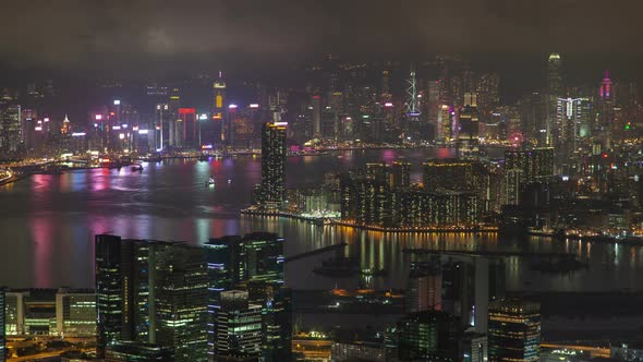 Cityscape Buildings Illumination Reflected in Hong Kong Bay