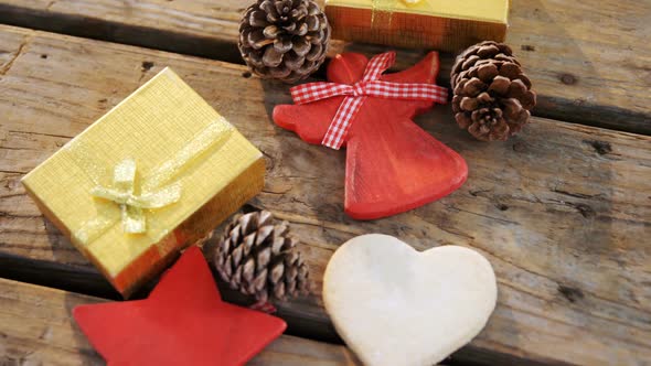 Christmas cookie and decorations on wooden table