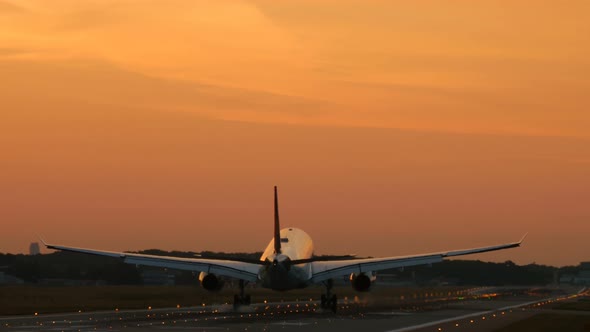 Twin Engine Airplane Approach at Early Morning