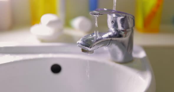 Clean the Tap with a Disinfectant