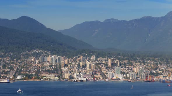 North Vancouver Waterfront And Mountains In The Sun