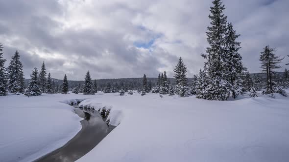 The Jizera stream, flowing through the Jizera Mountains in the Czech Republic. Winter season