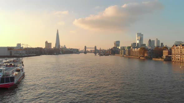 dolly forward drone shot London thames river tower bridge shard city centre