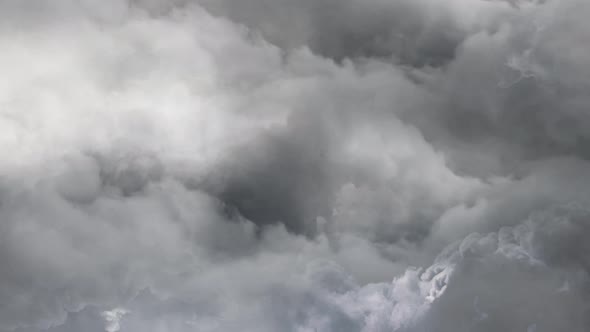 4k clouds close up on sky with thunderstorm