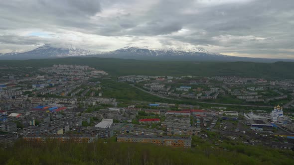 Summer Top View of Petropavlovsk Kamchatsky City on Background of Volcano