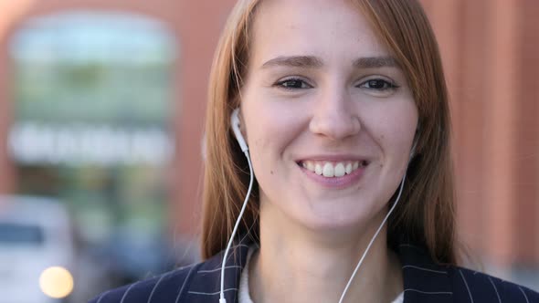 Video Chat by Woman Standing Outside Office, Talking Casually