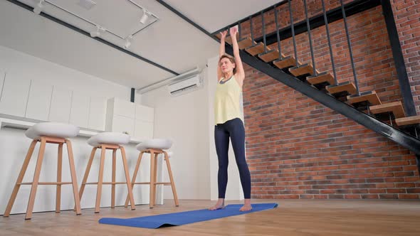 Caucasian Female Stretching in Living Room / Videohive, Stock footage, Sports