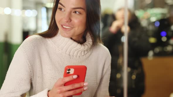 Attractive Woman Using Phone at Coffee Shop Texting Message