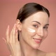 Woman Applying Cosmetic Product on Face - VideoHive Item for Sale