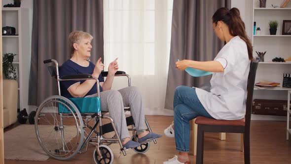 Rehabilitation Treatment for Handicapped Old Woman