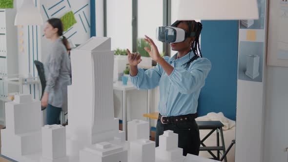 Woman Architect Wearing Vr Glasses to Design Construction Layout and Building Model