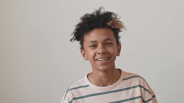 Portrait of Cheerful Biracial Teenage Boy