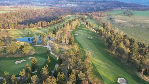 Flying over lakes, trees and countryside on a spring morning