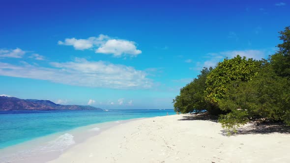 Aerial view panorama of perfect shore beach time by blue lagoon and bright sandy background of a day