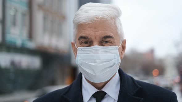 Amsterdam Businessman Looks at Camera