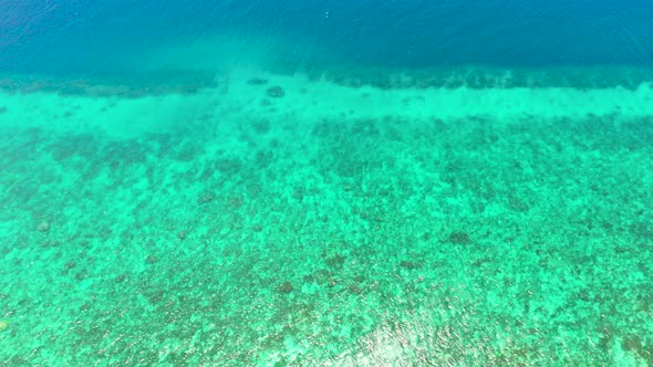 Sea Surface in a Turquoise Lagoon Top View