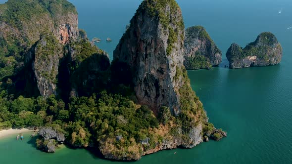 Beautiful energetic aerial shot of large limestone karst at Railay Beach, Ao Nang, Krabi, Thailand