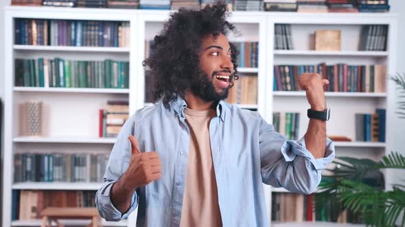 Cheerful Young Indian Man Office Worker Depicts Simple Dance Making Cool Gesture