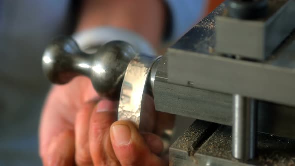 Craftswoman preparing ring