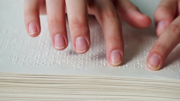 Blind Person Reading with His Hands Using Braille Book Poorly Seeing Man Learning to Read Disabled