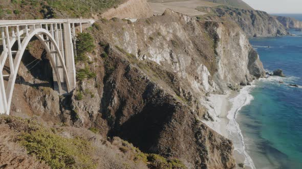 gimbal tilt and pan shot of bixby bridge at big sur