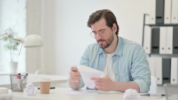 Young Man Unable to Write on Paper Failure