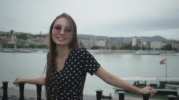 Happy Girl Portrait Against Budapest View with Danube River Hungary