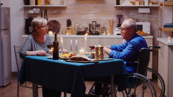 Man with Disabilities Talking with Wife