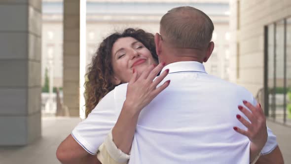 Beautiful Middleaged Woman Hugs When Meeting Her Beloved Man