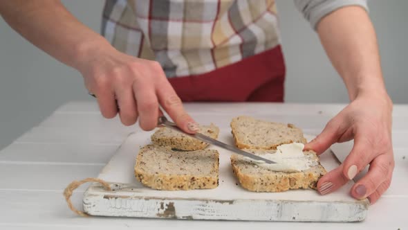 Woman Preparing Sandwich