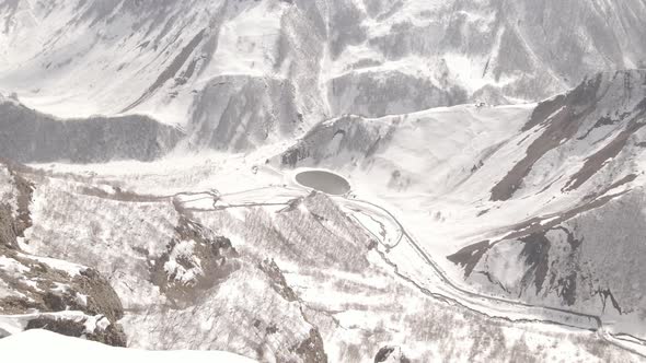 Gudauri, Georgia - April 12, 2021: Aerial view of Russia–Georgia Friendship Monument